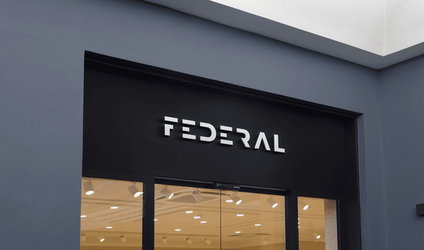 Federal wordmark as illuminated signage above a shopfront entrance