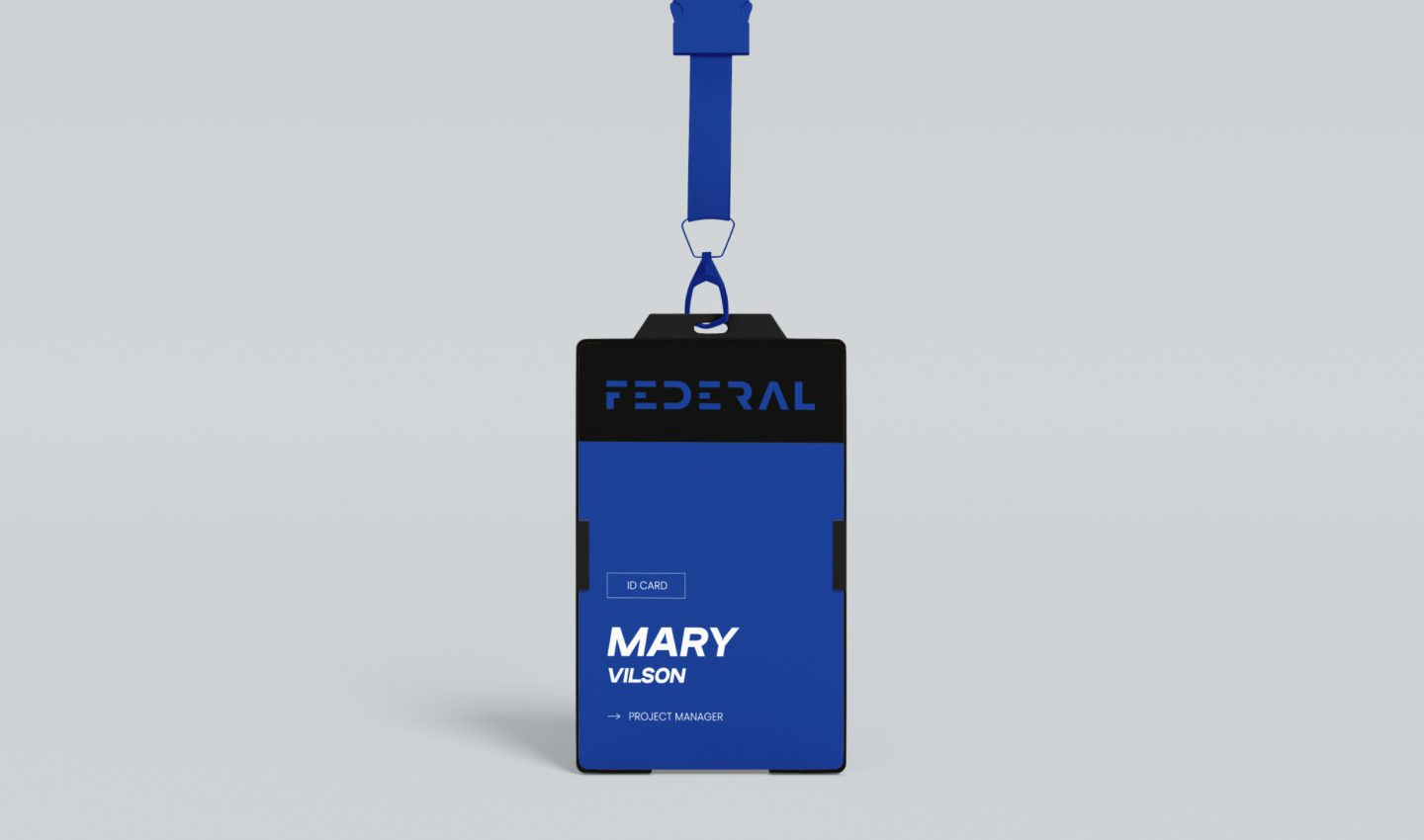 Federal staff ID badge in blue and black bearing the F mark
