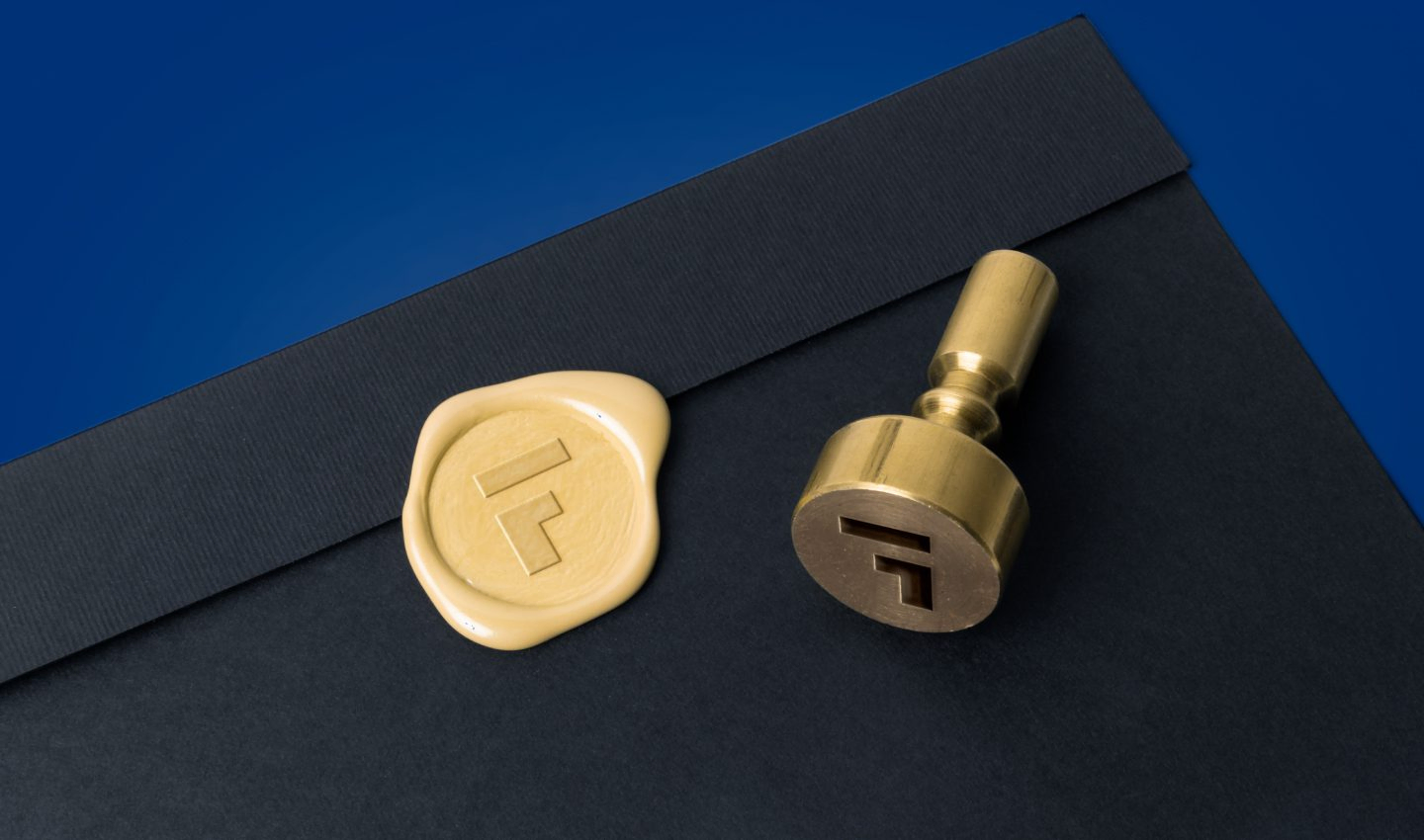 Wax seal and brass stamp bearing the Federal F mark