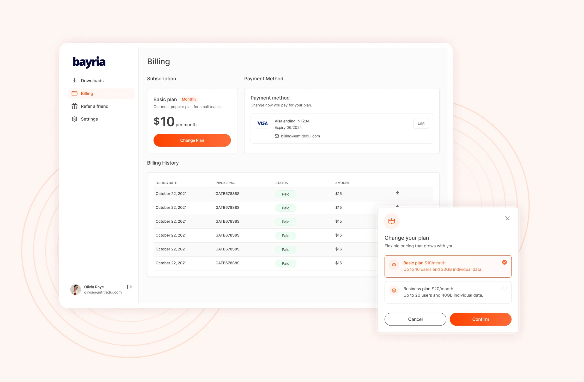 Desktop billing screen showing the current subscription plan, payment method on file, a table of paid invoices, and a change-plan dialog comparing two pricing tiers